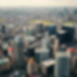 Aerial view of a bustling city showcasing skyscrapers and residential buildings