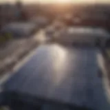 Aerial view of solar panels on a rooftop in an urban environment