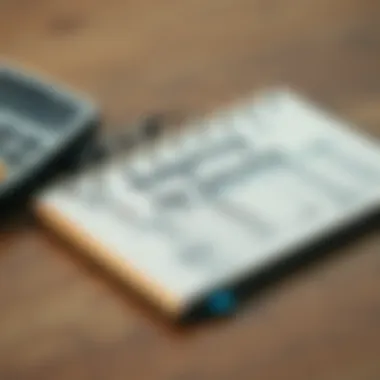 A notepad with a detailed budget plan